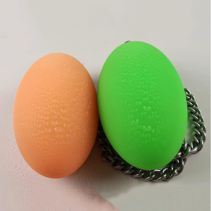 Анальний плаг Guspiun силіконовий, яйцеподібний, з металевим ланцюгом, 6.5 см, S (Помаранчевий)