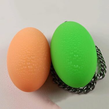 Анальний плаг Guspiun силіконовий, яйцеподібний, з металевим ланцюгом, 6.5 см, S (Помаранчевий)